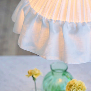 Ceiling lamp with ruffles